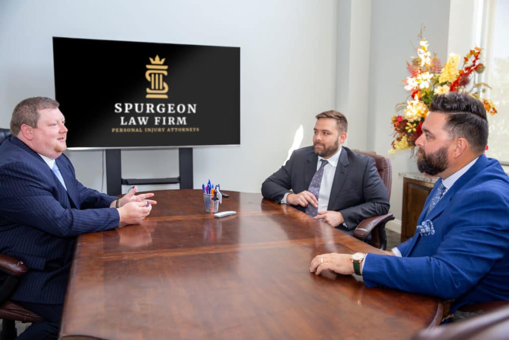 Attorneys at Spurgeon Law Firm meeting